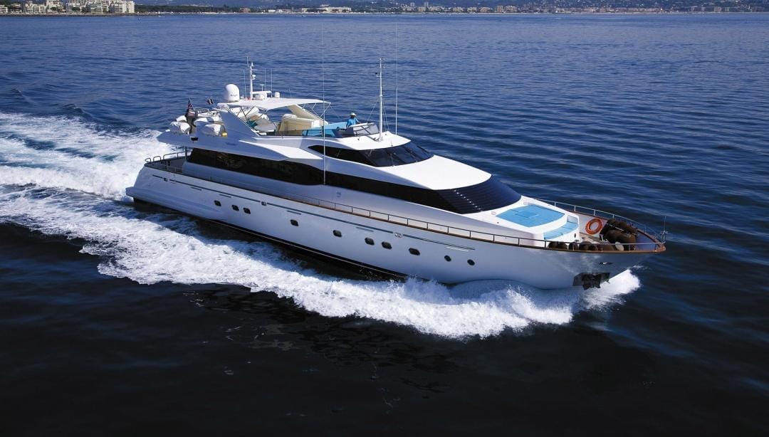 Professional yacht captain sailing aboard a yacht at sea