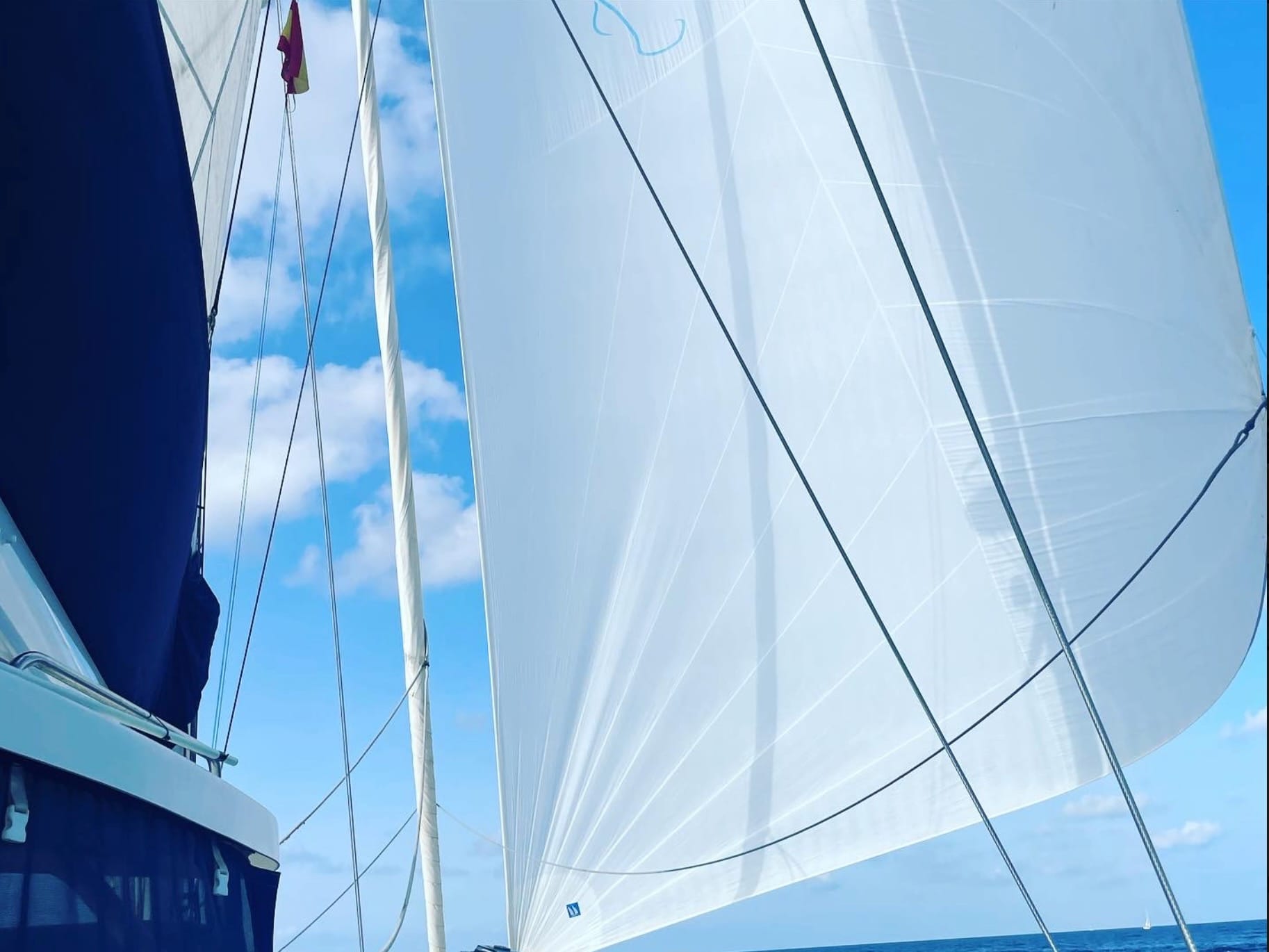 Sailing yacht under full sail during an offshore passage