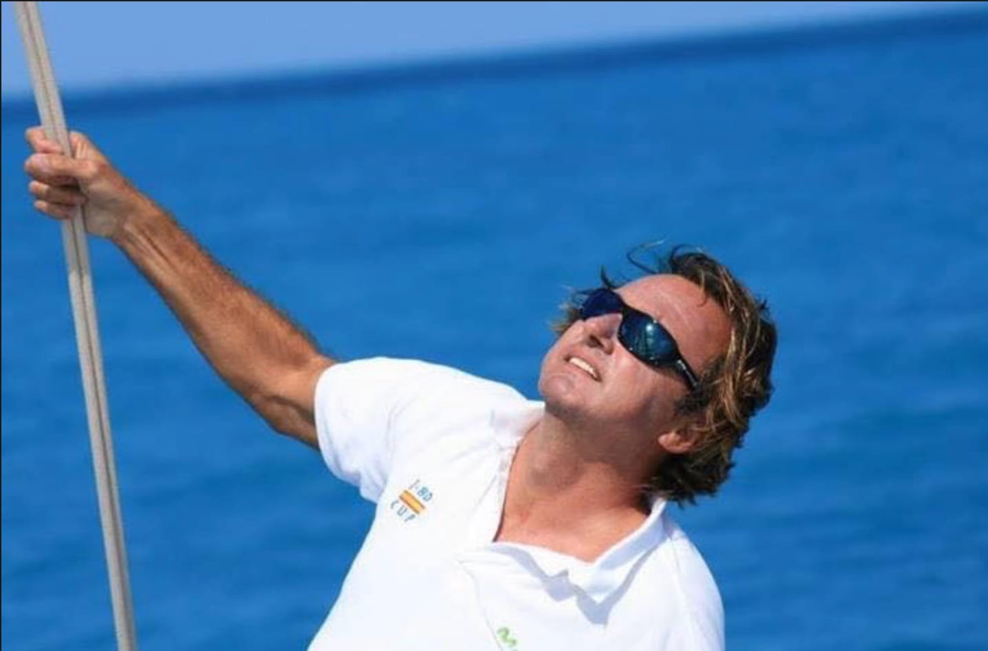 Nacho Lamadrid sailing yacht captain working onboard during a sailing passage